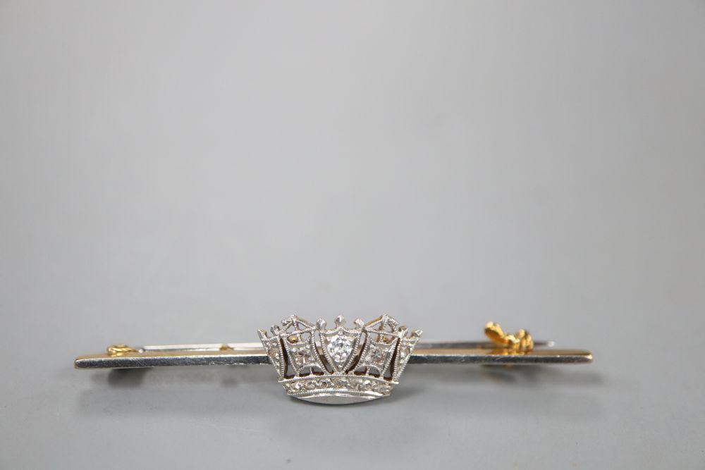 A 14ct, plat and diamond set coronet sweethearts bar brooch, 49mm, gross 3.7 grams, in Gieves box.